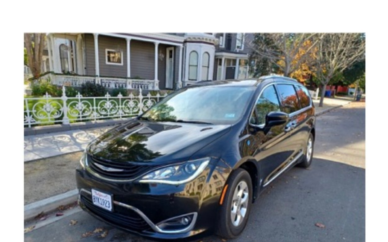 Vivian's late-model SUV, parked and ready